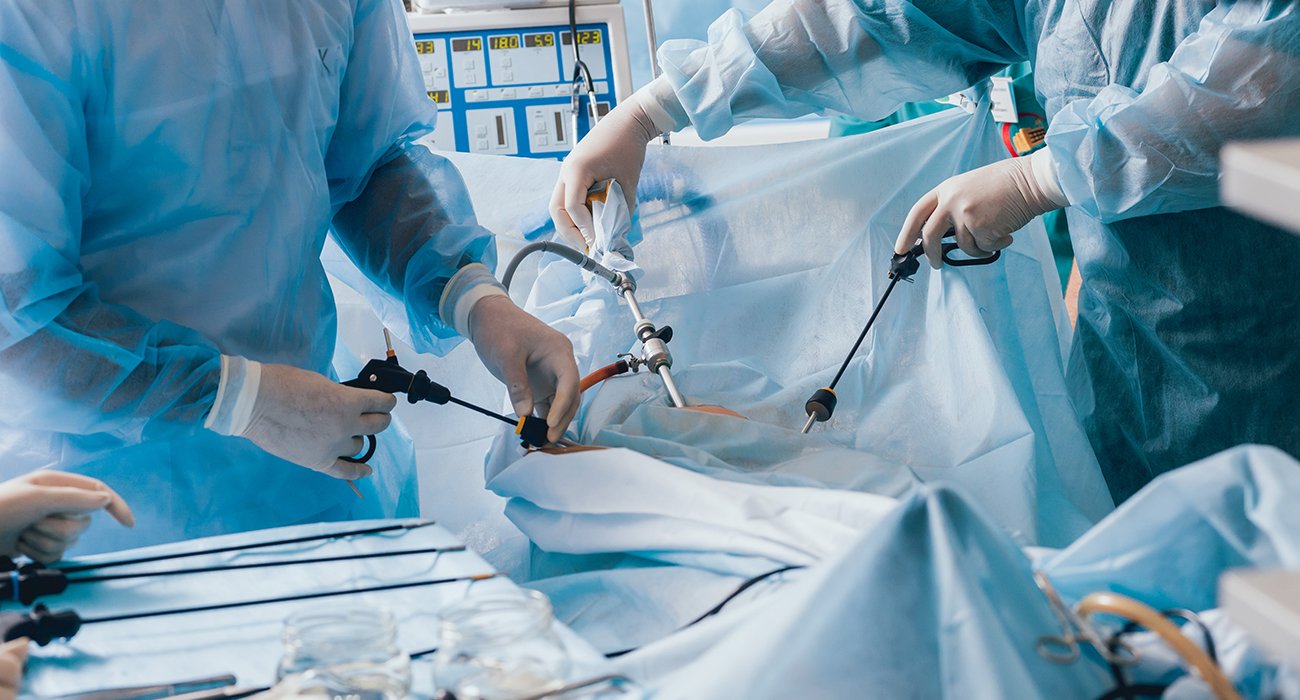Primary Alt Text: An expert cardiologist performing a cardiac catheterization procedure in a state-of-the-art cath lab in Kodambakkam, Chennai.