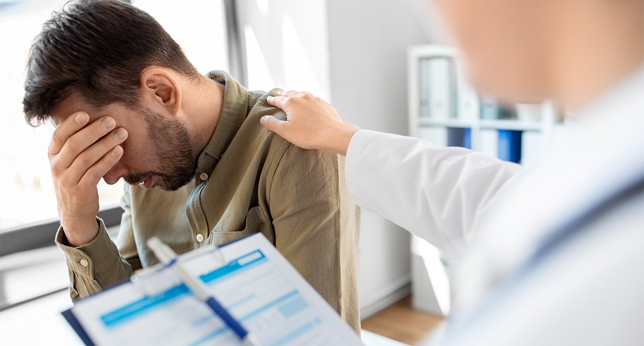A patient undergoing a TMT stress test on a treadmill in Chennai, with a medical professional monitoring heart activity.